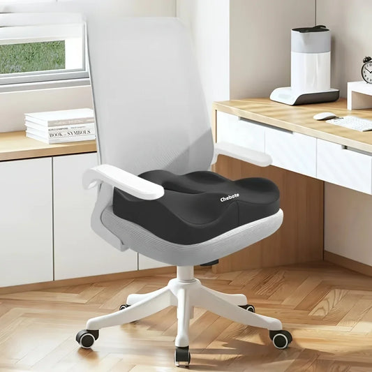 Mal au bas du dos au bureau : 3 solutions simples pour soulager le coccyx